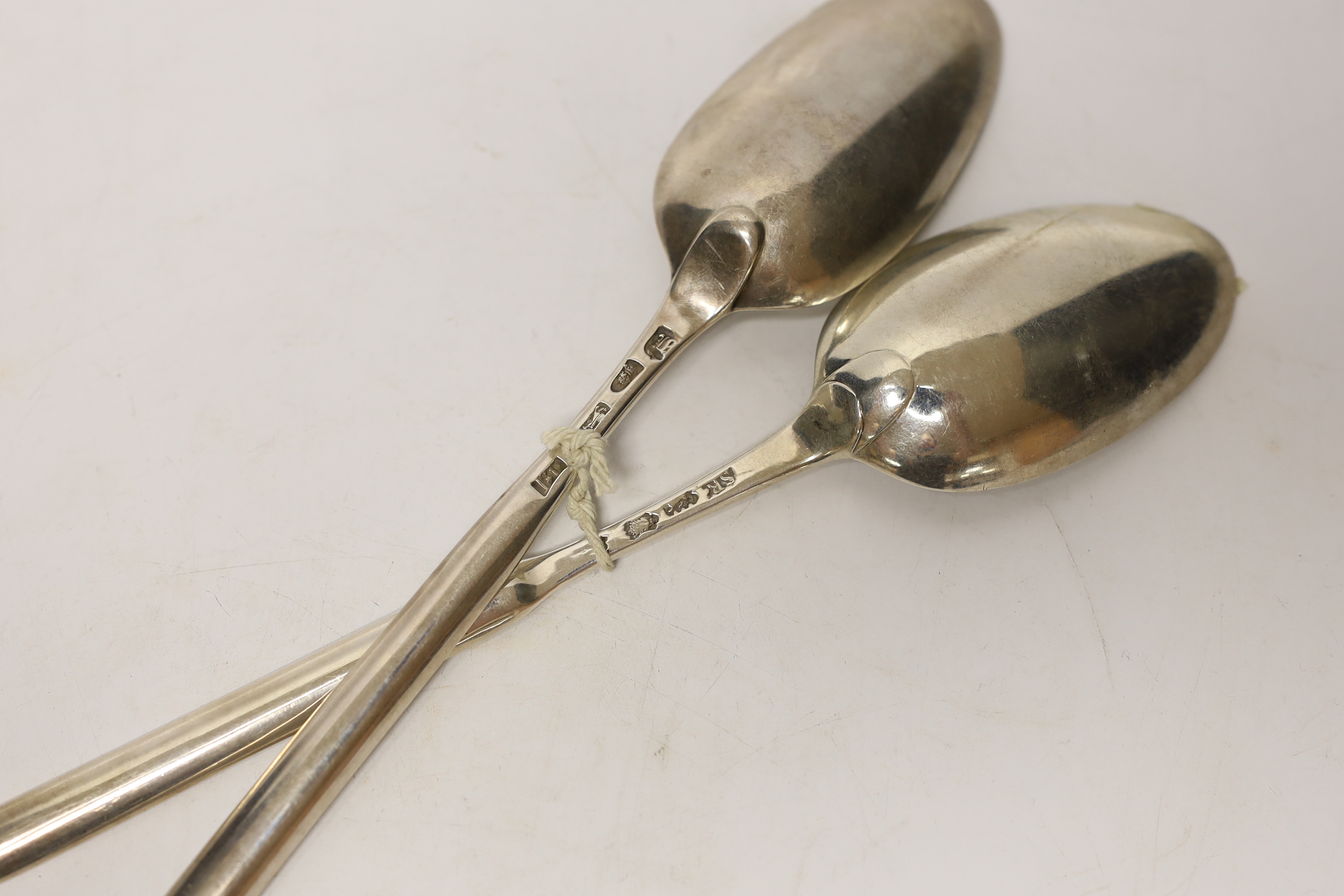 Two 18th century silver combination marrow scoop spoons, London, 1766 and Samuel Roby, London, circa 1745, 22.6cm, 130 grams.